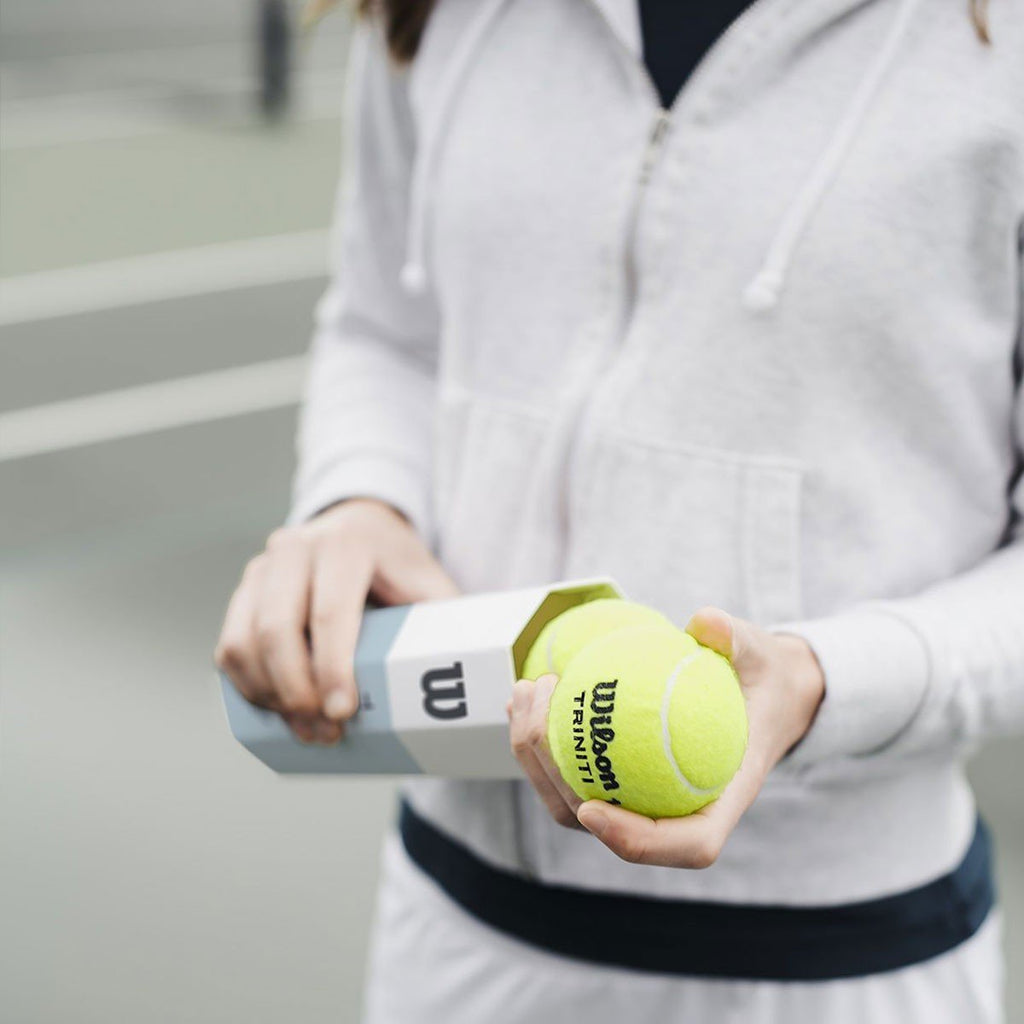 |Wilson Triniti Tennis Balls - Can of 4 - Lifestyle |